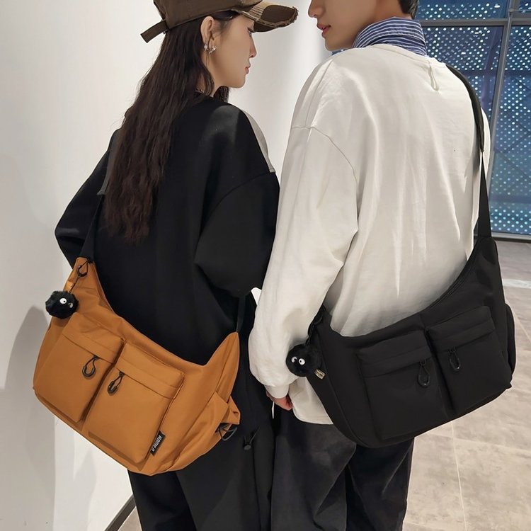 Retro popular fashion messenger bag sports style Ruiying versatile large-capacity crossbody bag couple style shoulder bag