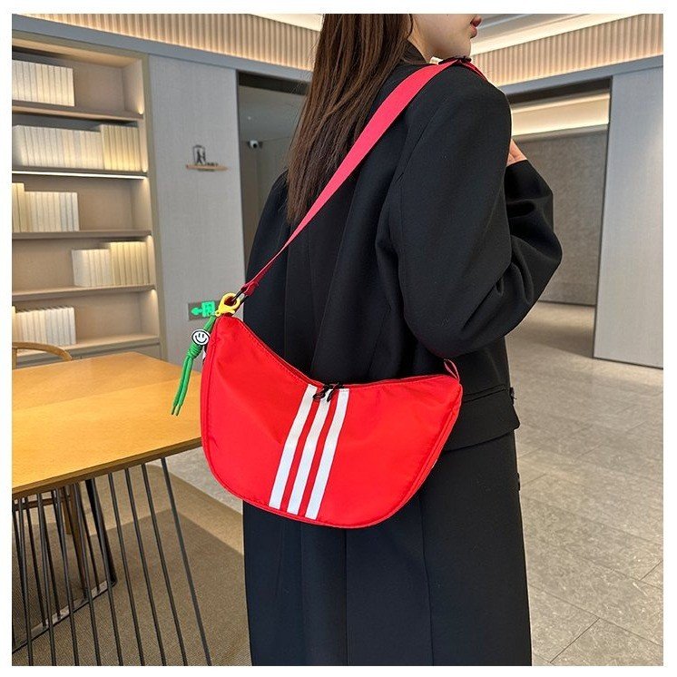 Japanese and Korean popular striped canvas bags for women this year 2024 new nylon sports dumpling bag versatile crossbody bag trend
