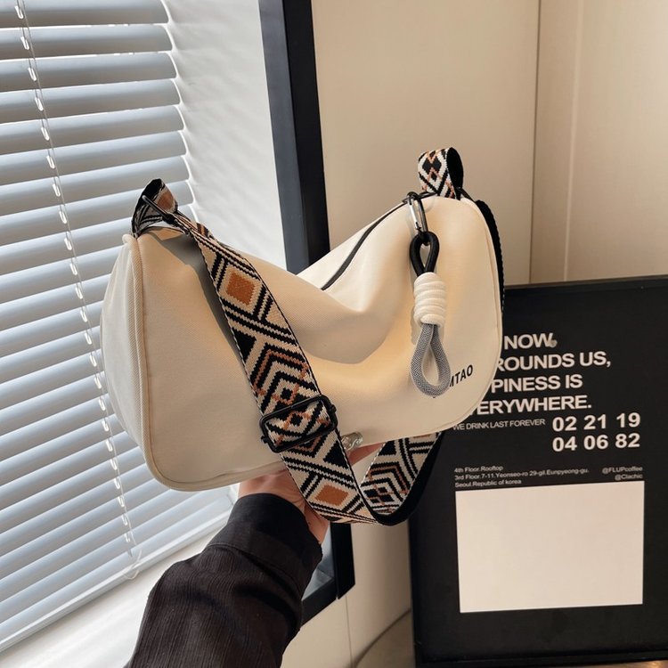 Canvas bag for women large capacity 2024 new ins versatile wide shoulder strap dumpling bag fashionable niche design crossbody bag
