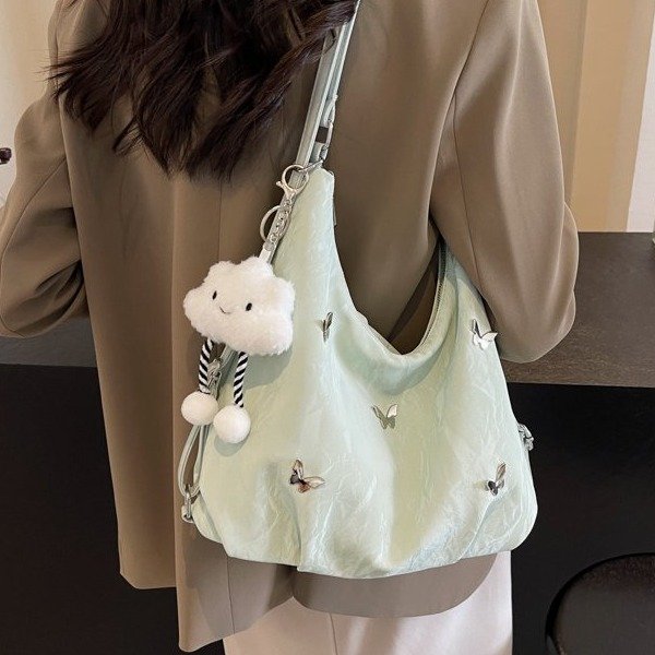 Canvas soft surface large capacity bag for women 2024 new fashion commuter backpack multi-purpose shoulder bucket bag