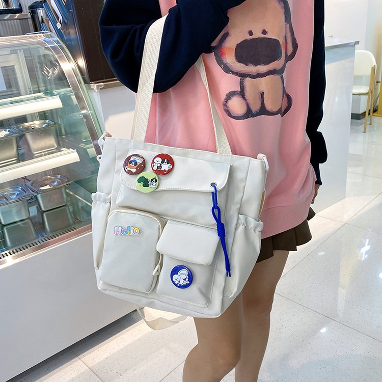 Large-capacity commuter canvas bag Japanese ins student class versatile shoulder bag college girl niche crossbody bag