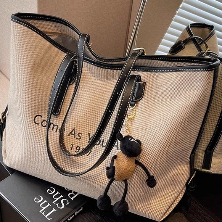 This year's popular bags for women large capacity 2024 new versatile canvas shoulder shopping bag class commuting tote bag
