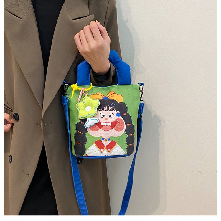 Illustration design graffiti printed canvas bag new niche personality funny shoulder crossbody bag bucket handbag