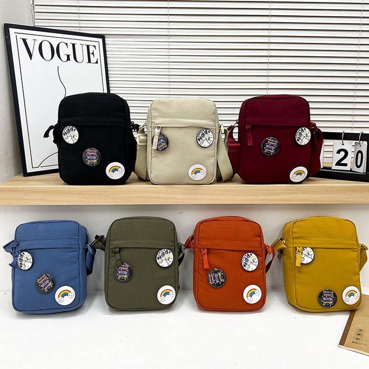 One-shoulder cross-body small backpack men's Japanese and Korean casual new student mobile phone bag shopping women's one-shoulder small shoulder bag wholesale