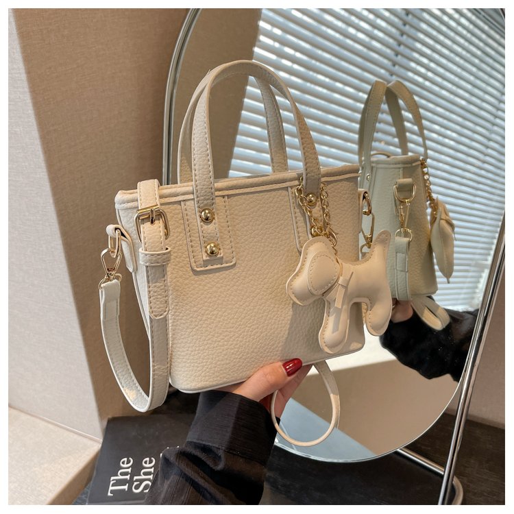 Spring new large-capacity bucket bag for women, fashionable and versatile handbag, trendy pendant shoulder crossbody bag