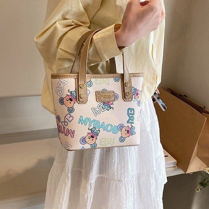 Cute printed small handbag for women Korean style new fashion contrasting color tote bag for class commuting single shoulder crossbody bag