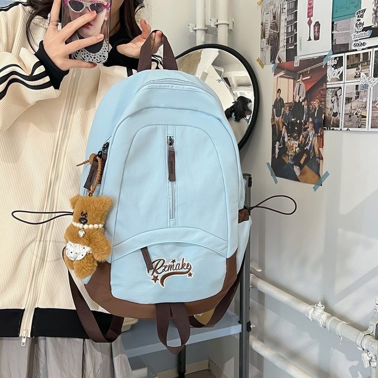 New 2024 niche large-capacity college student backpack new high-end lightweight high school student school bag