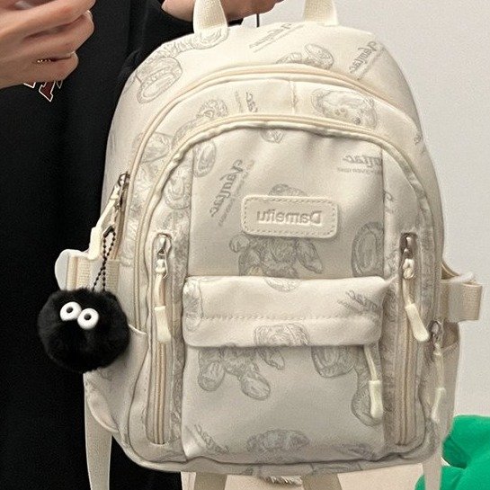 School bag for female junior high school students simple and versatile printed bear niche design 2024 new college student computer backpack trend