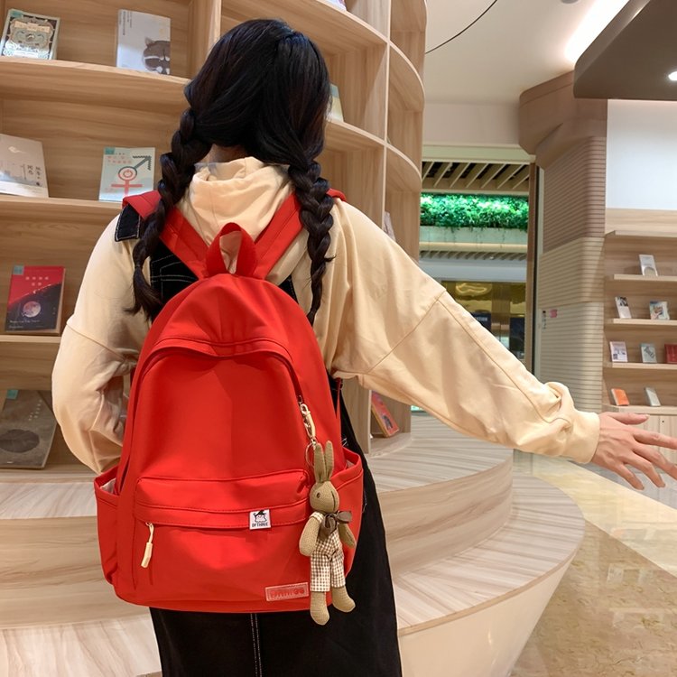 Schoolbag female Korean version college student junior high school student large capacity trendy backpack ins Harajuku solid color simple backpack