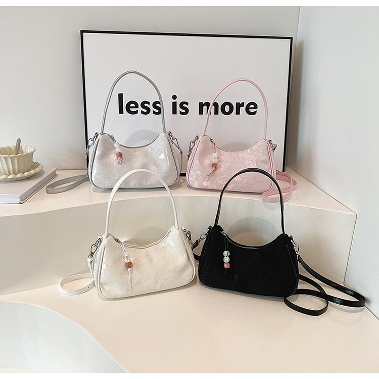Hand-carrying new Chinese style bag for women 2024 new summer style super hot national style embroidered dumpling bag niche fashion shoulder bag