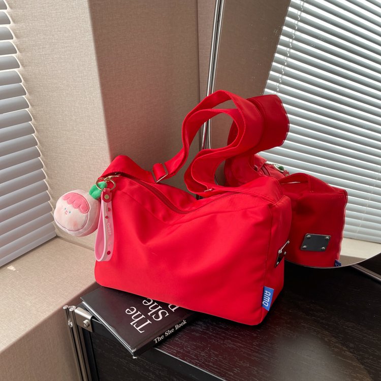 Simple nylon dumpling bag women's new fashion forest style literary canvas bag college student class single shoulder messenger bag
