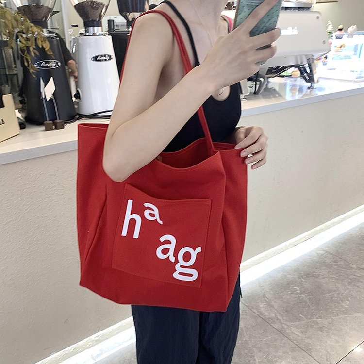 Large-capacity red canvas bag for women 2024 new trendy Korean style lazy style shoulder bag student commuter tote bag