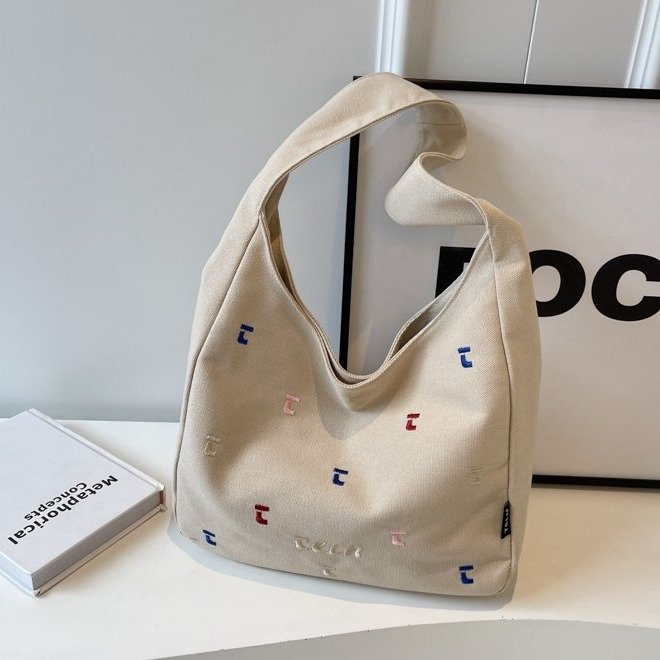 Korean letter embroidered armpit bag large capacity commuting Ruiying canvas bag female middle school student school bag travel bag