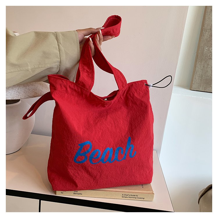 Lazy style printed shoulder bag Korean style candy color large capacity tote bag women's canvas bag cloth bag armpit handbag