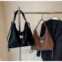 2024 New Versatile Dumpling Bag Women's Fashion Simple Large Capacity Commuting Backpack Niche Retro Bucket Bag