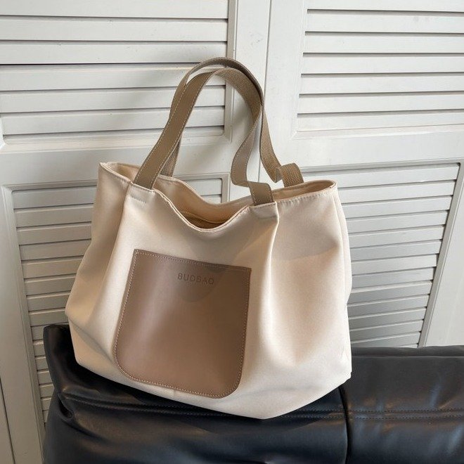 Casual large-capacity canvas bag for women 2024 new style simple and versatile commuter shoulder bag lightweight travel bag