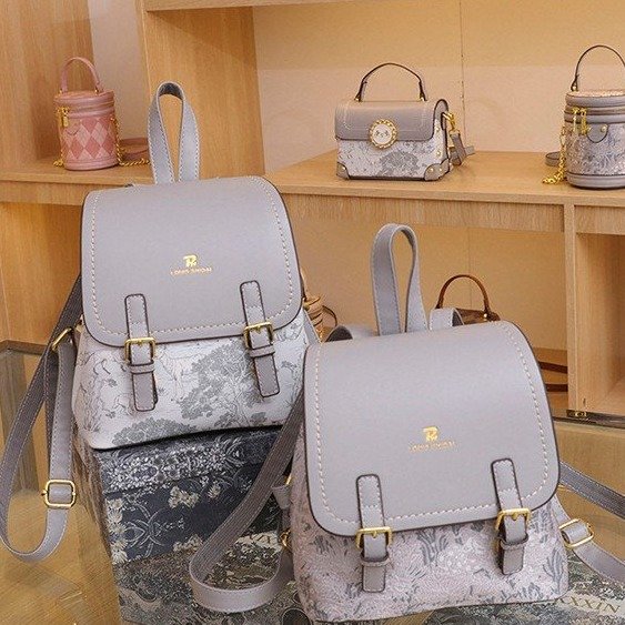 Hong Kong purchasing soft leather backpack women's new fashion ins women's fashion Korean version large capacity school bag women's backpack