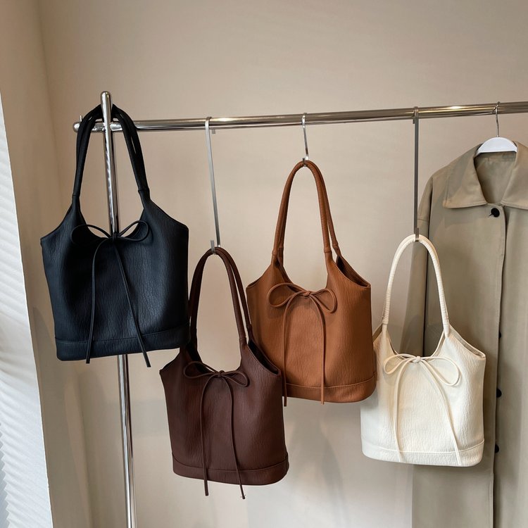2024 Korean version niche commuter women's bag versatile casual bag French bow large capacity one-shoulder armpit tote bag