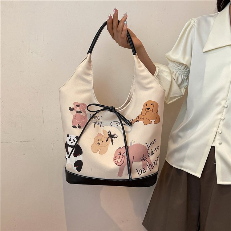 Small fresh canvas style tote bag 2024 summer new style handheld women's shoulder bag ins lightweight shopping bag