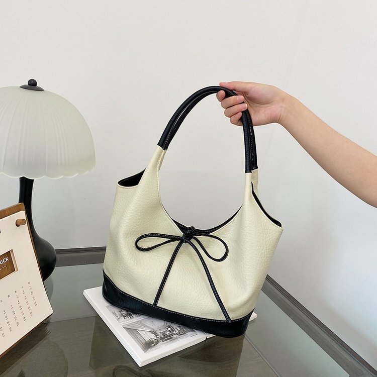 Niche retro one-shoulder canvas bag for women 2024 new Korean version simple small work bag armpit commuter bag