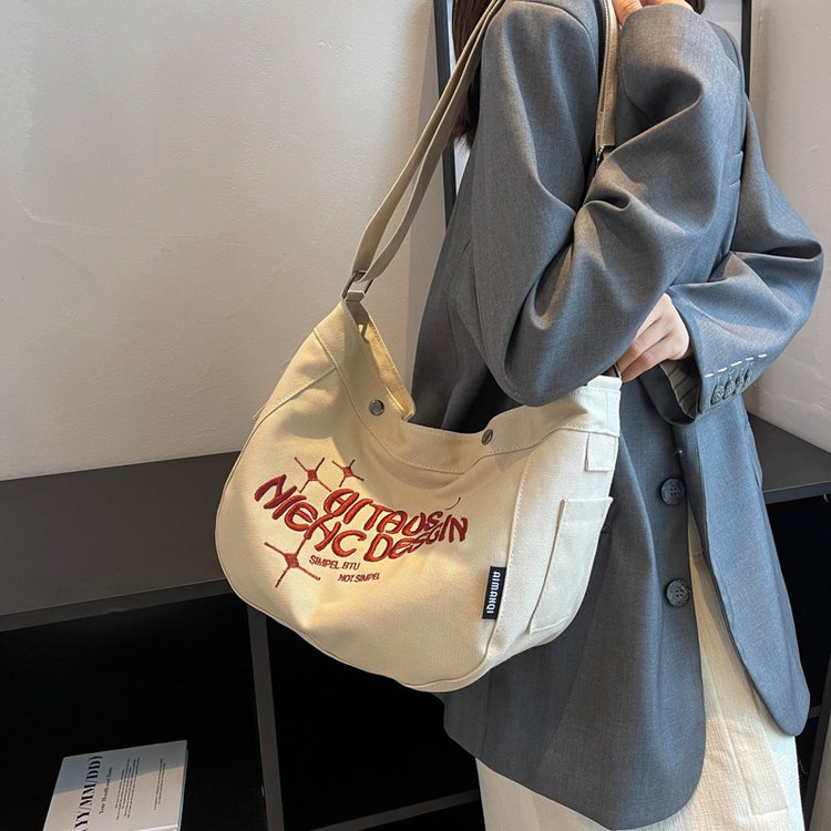 Japanese canvas bag female college students attend class ins lazy style large capacity one-shoulder cross-body niche embroidered tote bag
