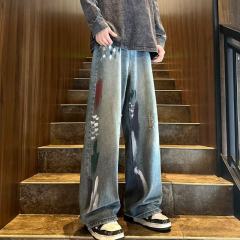 American high street jeans for men with graffiti holes and personalized autumn new ins wide-leg trousers