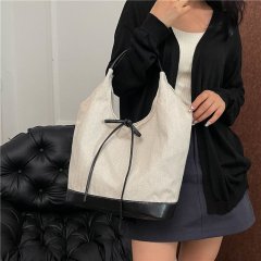 Korean niche stitched canvas tote bag for women 2024 new commuter fashion handbag versatile shoulder armpit bag