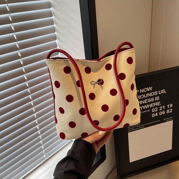 Niche polka dot canvas bucket small bag for women 2024 new style versatile single shoulder underarm bag small tote bag for going out to work