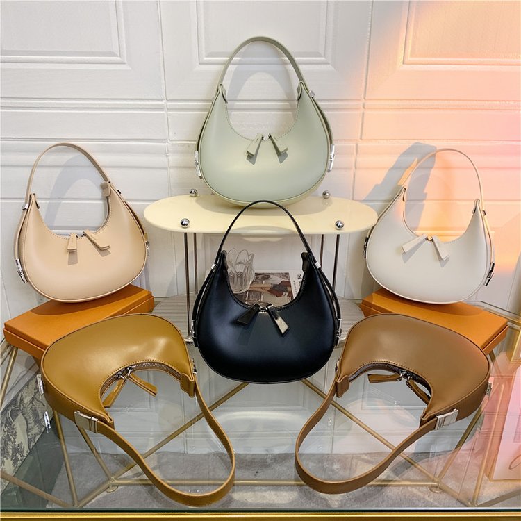 Niche design handbags for women Korean new crescent bag hot girl armpit bag metal buckle small round bag for women