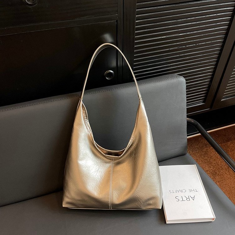 This year's popular fashion Korean version versatile ins shoulder armpit bag commuting texture solid color handbag tote bag for women
