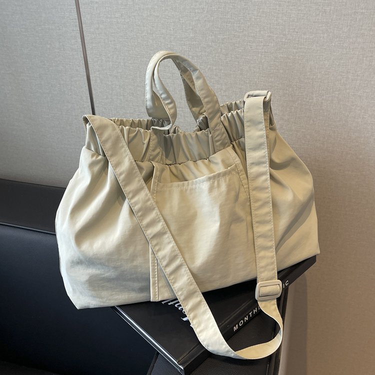 Fashionable and Casual Solid Color Polyester Cloth Dumpling Bag 2024 New Simple and Versatile Stowable Pleated Shoulder Bag