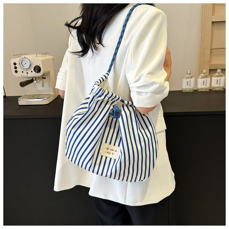 Korean embossed cartoon canvas bag for women large capacity handbag for shopping, work and commuting bag