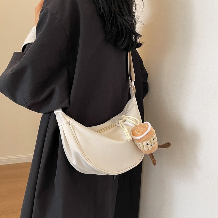 2024 Soft Leather Bag Girls Texture Niche Commuting Shoulder Crossbody Dumpling Bag Student Korean Version Versatile Sports Bag