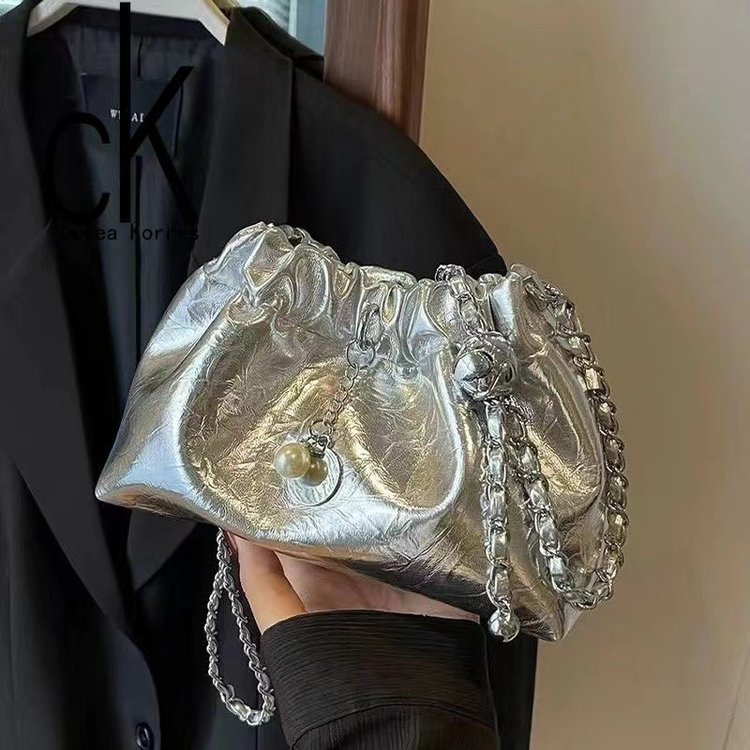 Summer high-end niche versatile cross-body chain bag for women 2024 new silver drawstring bucket bag cloud bag