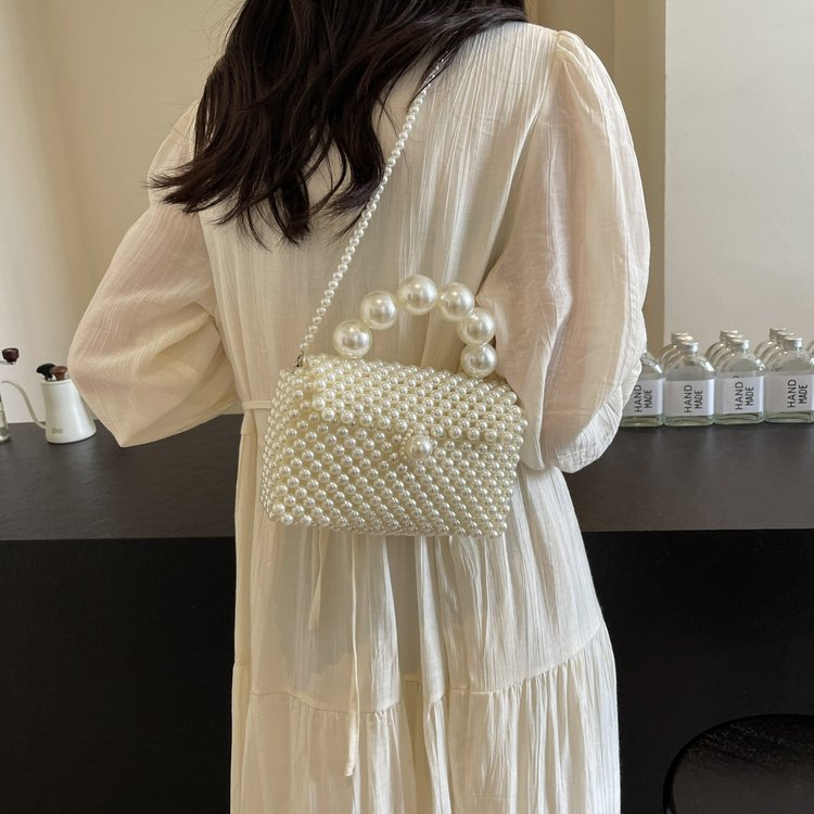 New handbag French retro hollow fairy hand-woven bead bag metal niche bead bag pearl bag
