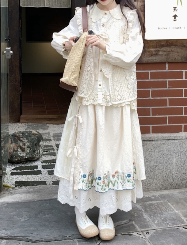 Hollow loose and sweet shirt + strappy stacked vest + embroidered skirt