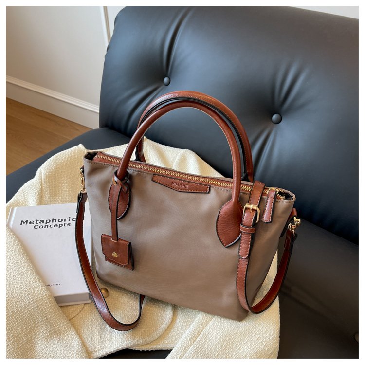 New niche high-end waterproof nylon fabric lightweight commuting shoulder hand-held crossbody bag large capacity women's bag
