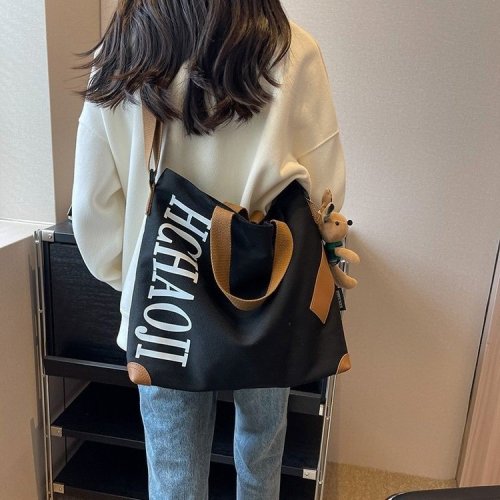 Japanese canvas bag large capacity women's bag casual and versatile single shoulder crossbody bag college student class commuting tote bag women