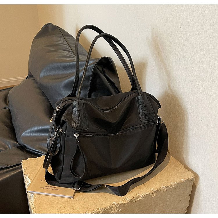 Foreign trade wholesale Oxford cloth large capacity new wandering crossbody bag commuter women's solid color multi-compartment handheld tote bag