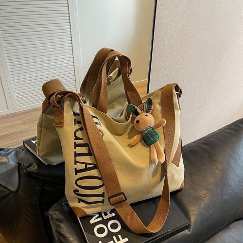 Japanese canvas bag large capacity women's bag casual and versatile single shoulder crossbody bag college student class commuting tote bag women
