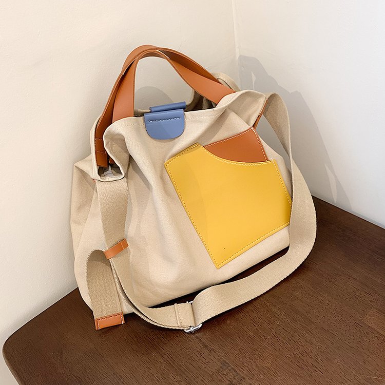 ins niche design spliced ​​canvas bag Korean style women's shoulder bag commuter tote bag versatile casual crossbody bag