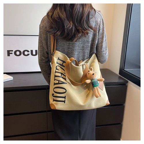 Japanese canvas bag large capacity women's bag casual and versatile single shoulder crossbody bag college student class commuting tote bag women