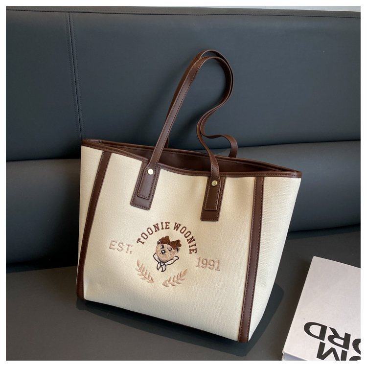High-end large-capacity bag for women, new canvas bag, fashionable and versatile shoulder bag, class commuting handheld tote bag
