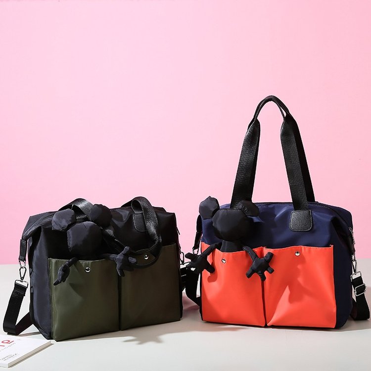 New travel bag for women, large capacity, portable, waterproof Oxford cloth for men, versatile, lightweight, one-shoulder, cross-body fitness bag for business trips