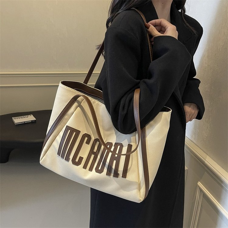 Literary Large Capacity Canvas Bag Women's Western Style Versatile Commuting Tote Bag New Autumn and Winter Underarm Bag Cross-Border