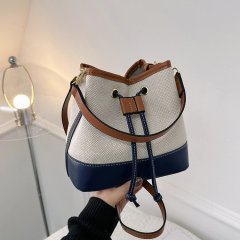 Bags for women 2024 new style canvas contrasting color portable bucket bag street trend texture drawstring single shoulder crossbody bag