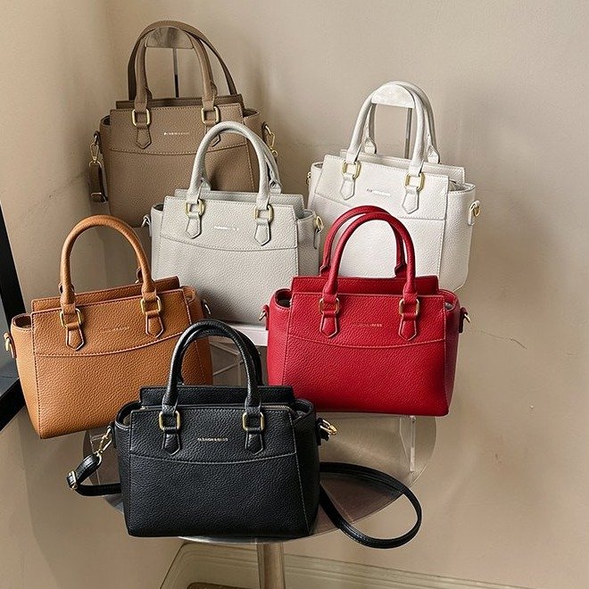 European and American bags for women 2024 new niche designer fashion commuter tote bag high-end portable crossbody bag