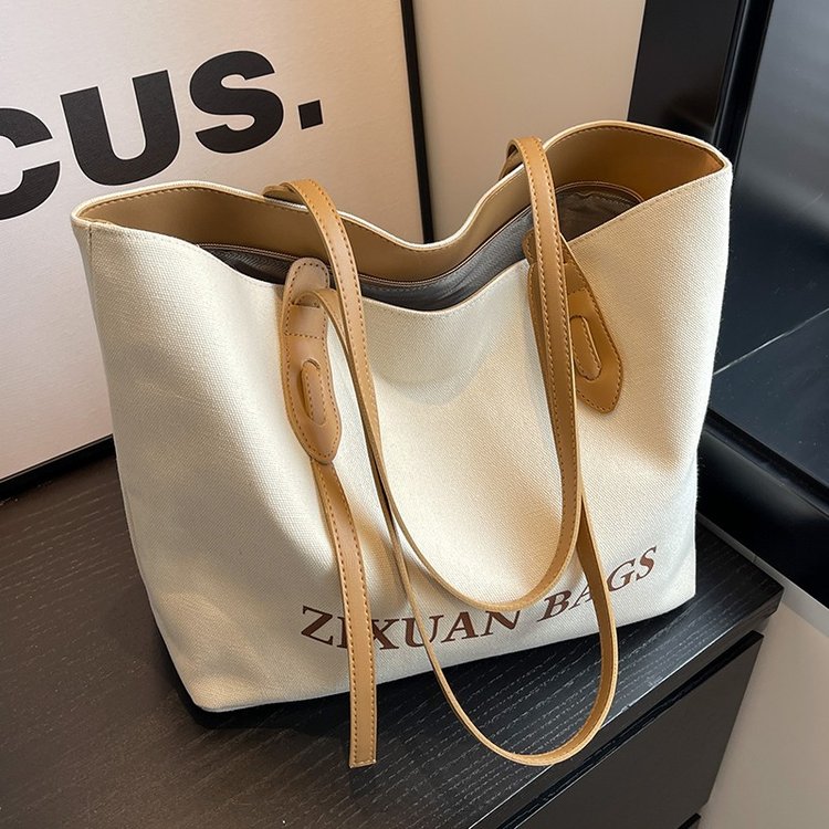 Tote bag, versatile new canvas women's bag, autumn and winter large capacity, high-end shoulder bag, large commuter bag