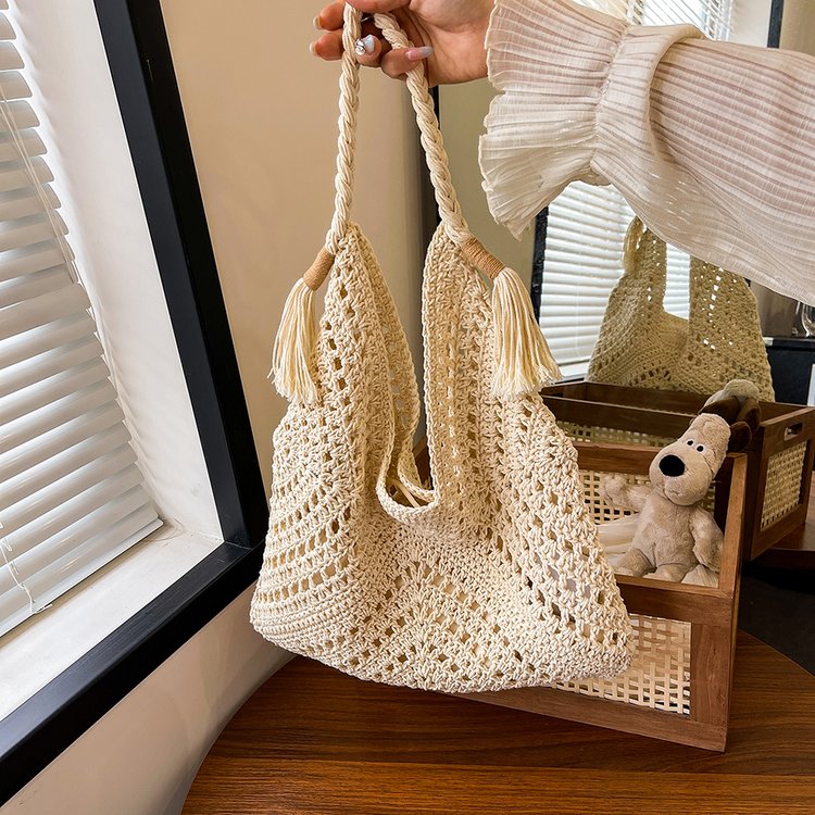 Manufacturer wholesale forest style summer 2024 new tote bag commuter portable shoulder straw bag niche woven bag