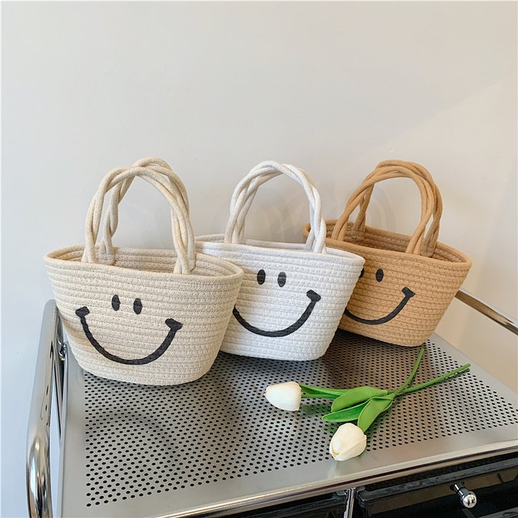 Wholesale straw bags, cotton rope woven handbags, beach bags, cute children's bags, smiley face handbags